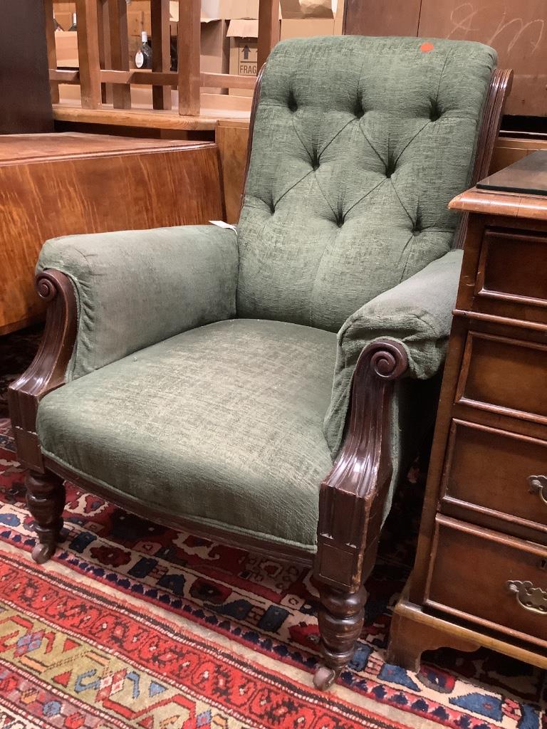 A Victorian mahogany framed armchair, in pale blue upholstery